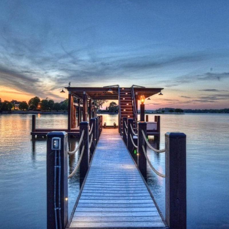 Houses with helicopter pads on Lakes Norman and Lake of the Ozarks: Waterfront house in North Carolina with a halipad looking like a floating island