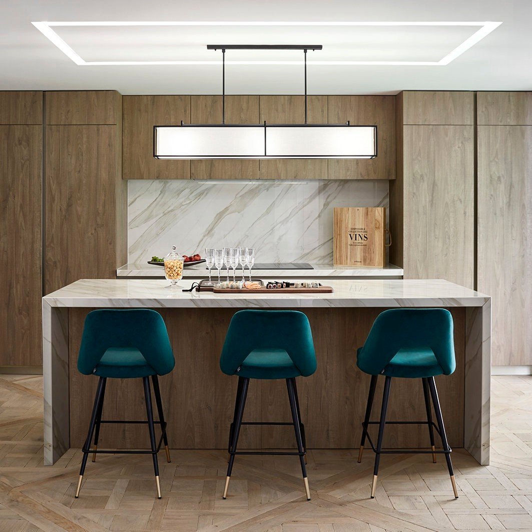 Luxury home bar decor: black stools, dining tables and pool tables, kitchen cabinets.