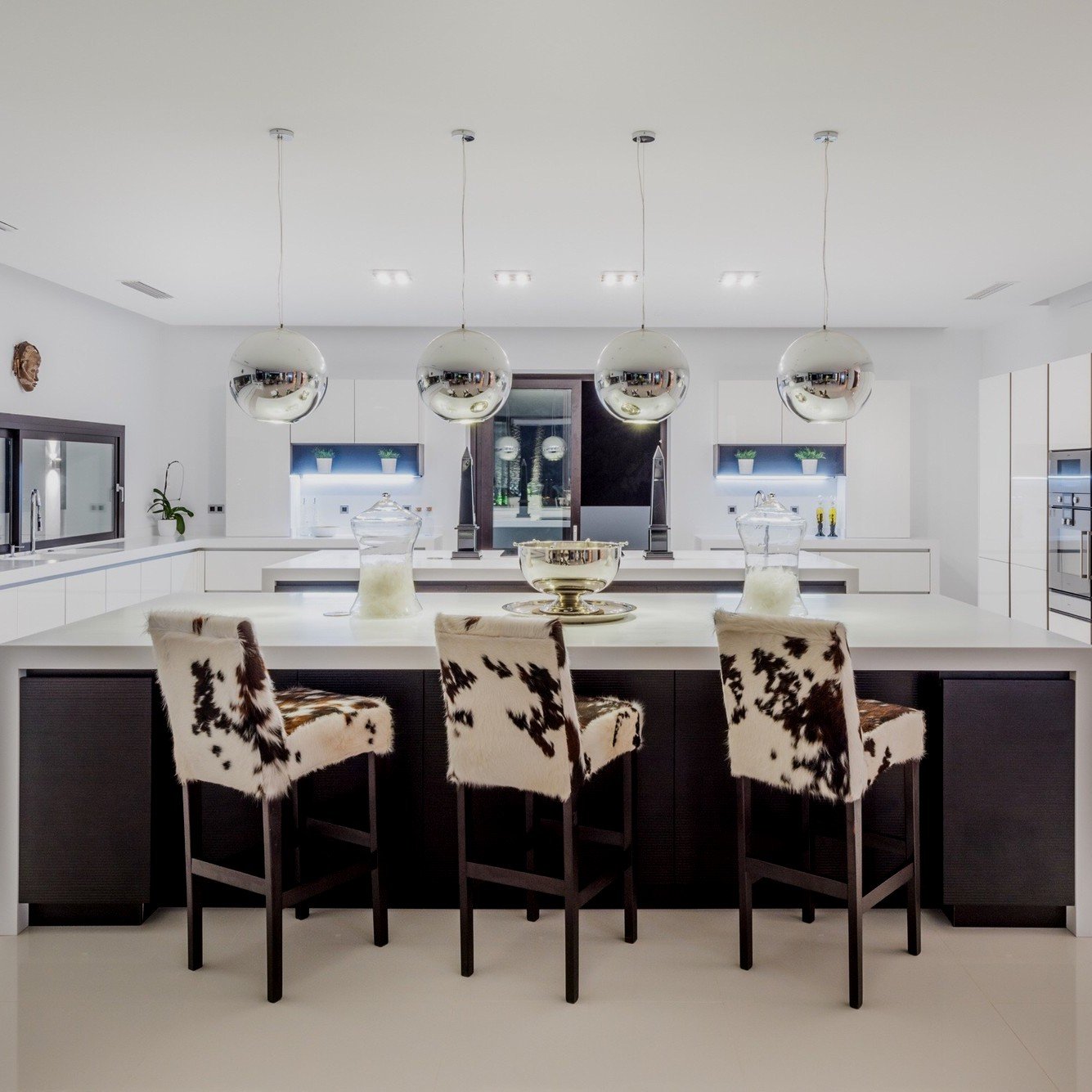 Luxury home bar area design: sports memorabilia and bar shelves, 