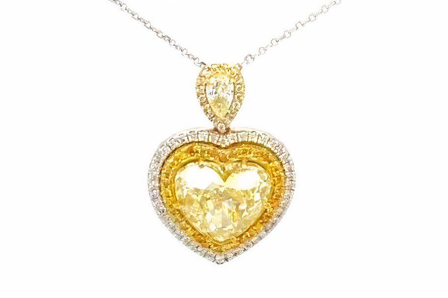 How are yellow diamonds formed, and are yellow diamonds cheaper than other colored gems?