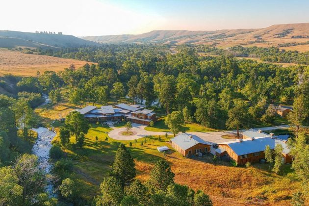 Compound living ideas: a large estate with a modern main house, an outdoor pool and new-builds in Wyoming