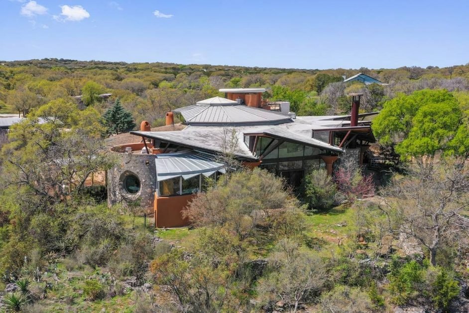 Frank Lloyd Wright style homes with an art glass and a fireplace