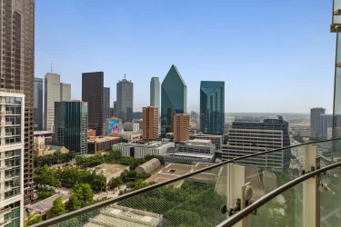Glass-Walled Masterpiece with Wrap-Around Views Up for Sale in Premier Downtown Dallas High-Rise
